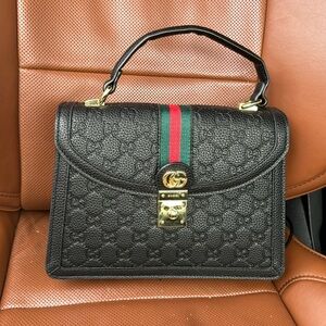 Black GG top handle bag